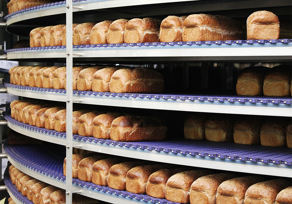 IMG_3499-carousel.jpg bread loaves moving in conveyor belt